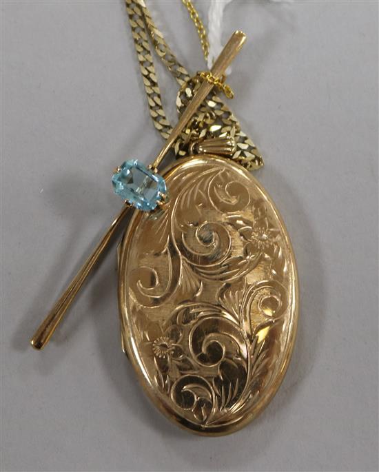 A 9ct gold bar brooch set with a topaz and a 9ct gold engraved oval locket on 9ct gold chain, 18.2gt gross